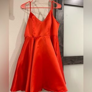 These Three boutique Red pocketed flare dress. Size Small never worn!!!